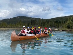 Group of International students in a canoe