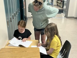 St. Teresa of Avila School students working in the hallway